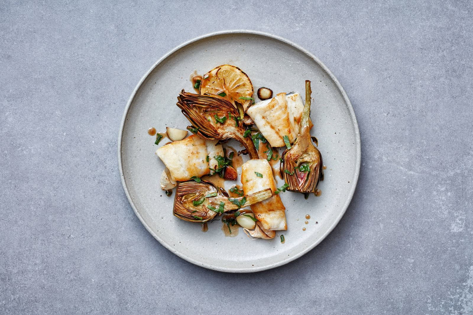 recipe image Καλκάνι, αγκινάρα, ψητό σκόρδο