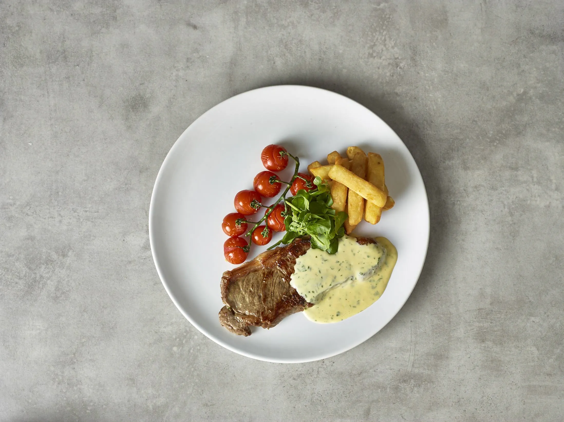 recipe image Σοτέ Μοσχαρίσιες Black Angus μπριζόλες με σάλτσα Μπεαρνέζ