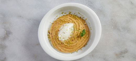 recipe image Αφρός χαλβά ταχινιού με καραμελωμένα φιστίκια Αιγίνης και σορμπέ λεμόνι