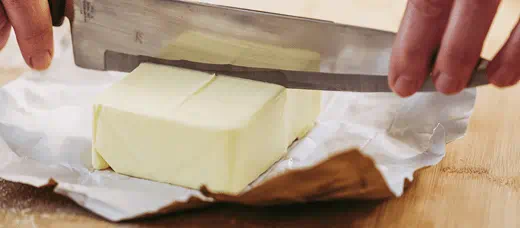 vegetabiliskt margarin, smör, kniv, wrapper